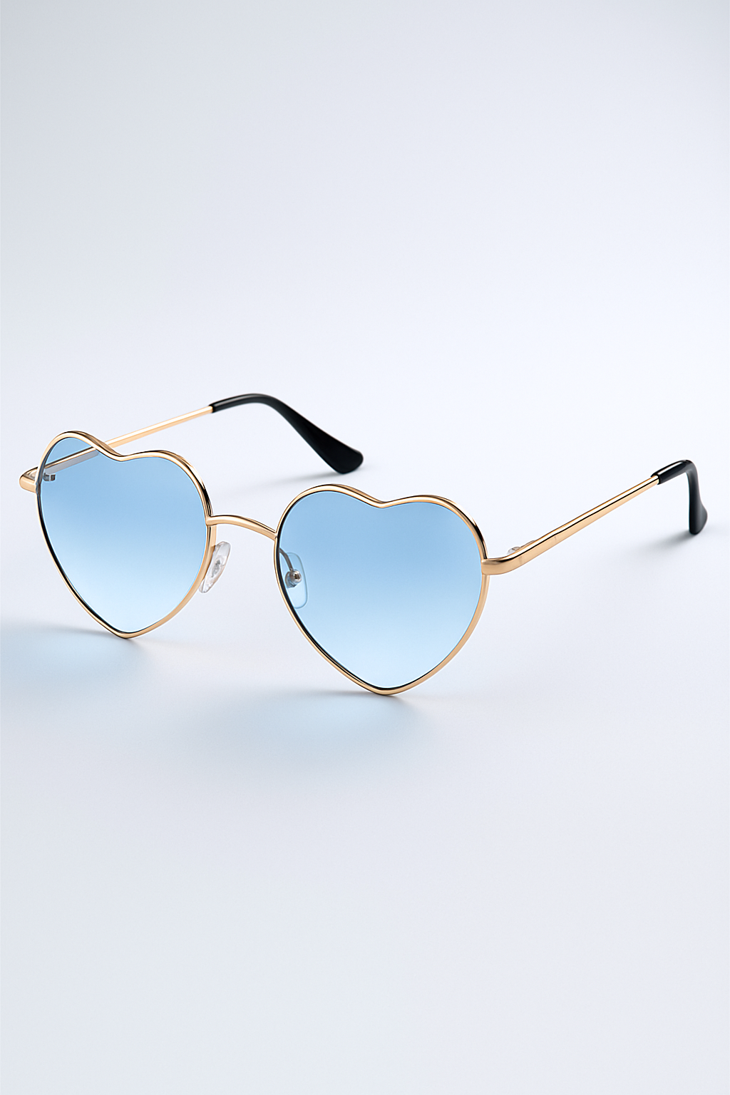 accessories : Gillian | Gradiënt zonnebril in hartvorm - Duidelijke en zure kleuren in Gouden Blauw Ander van Pantino