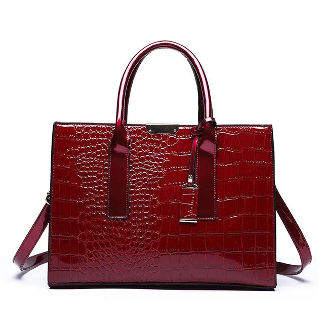 bags : TRIJN - Dameshandtas met krokodillenprint in Wijn rood van Pantino