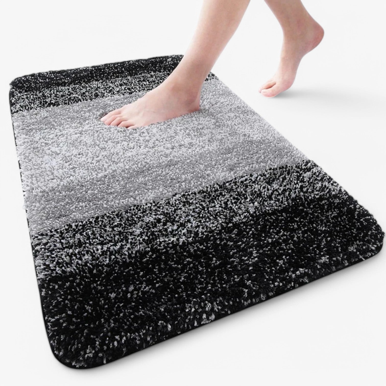 Heidi Droge voeten in een handomdraai - Superabsorberende antislip badmat- €25 : Heidi Droge voeten in een handomdraai - Superabsorberende antislip badmat in Zwart van Pantinoshop