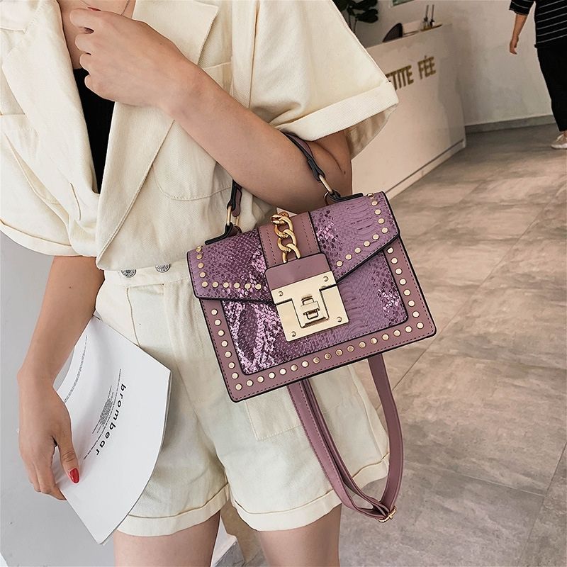 bags : Lucia - schoudertas van imitatieslangenleer met studs in Leid Rosa van Pantino