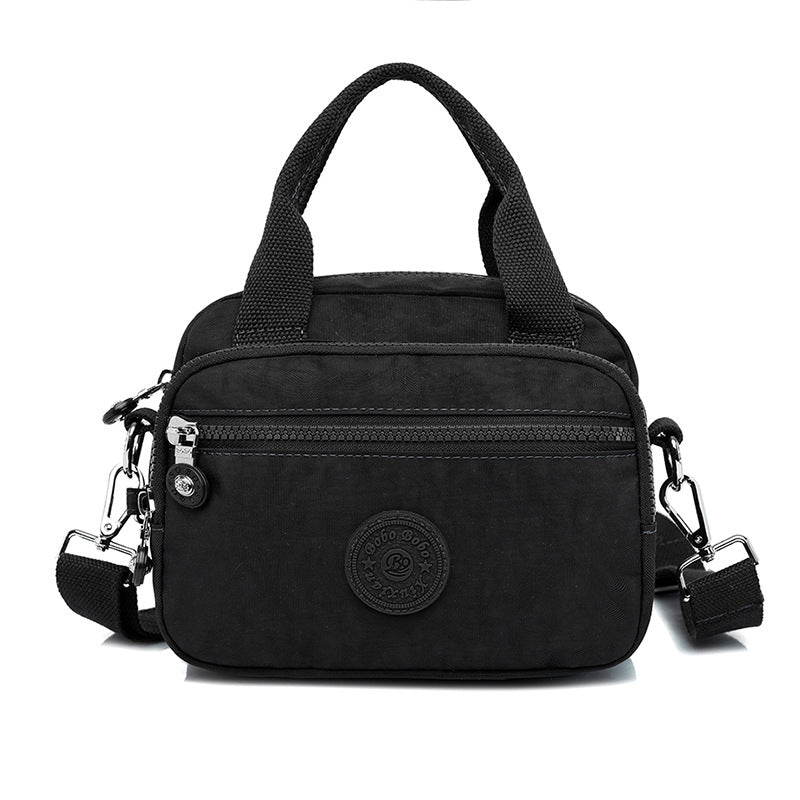 bags : DOUTZEN™ | Effen Kleur Casual Nylon Schoudertas Met Rits in Zwart van Pantino