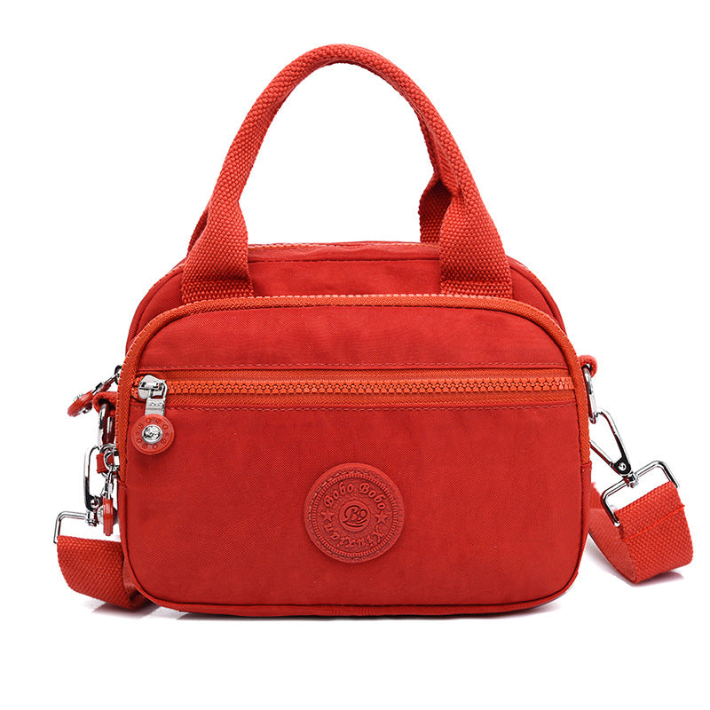 bags : DOUTZEN™ | Effen Kleur Casual Nylon Schoudertas Met Rits in Oranje van Pantino