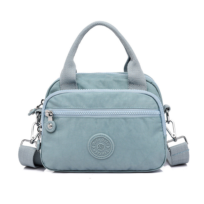 bags : DOUTZEN™ | Effen Kleur Casual Nylon Schoudertas Met Rits in Lichtblauw van Pantino