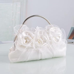 Elara - Elegante clutch met bloemenapplicaties - - Accessoires - Pantino