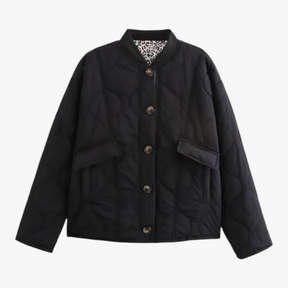 Damesbuitenjassen : Carina | Dames Gewatteerd Winterjack met Dierenprint in Zwart van Pantino