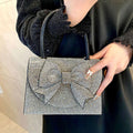 Pochette da donna nera - Da sera con fiocco in cristalli decorati - Tessuto