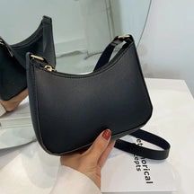 bags : Sara Leather Underarm Bag - Khaki in Black van Pantino