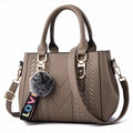 Bolso de mano elegante para mujer de cuero sintético